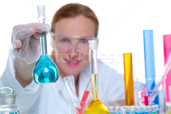 chemical laboratory scientist woman with glass flask Stock photo © lunamarina