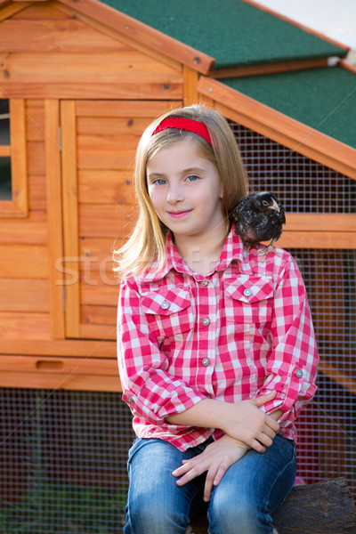 breeder hens kid girl rancher farmer with chicks in chicken coop Stock photo © lunamarina