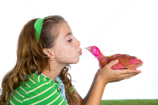 breeder hens kid girl rancher farmer kissing a chicken chick Stock photo © lunamarina