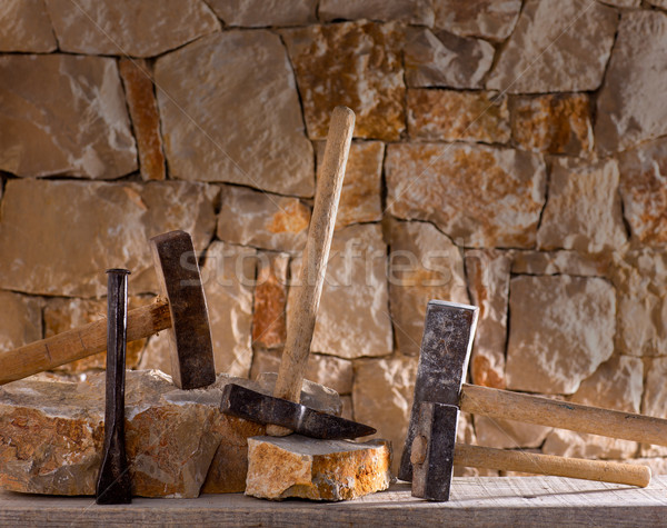 Hammer tools of stonecutter masonry work Stock photo © lunamarina