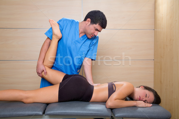 muscle power therapy on woman leg knee Stock photo © lunamarina