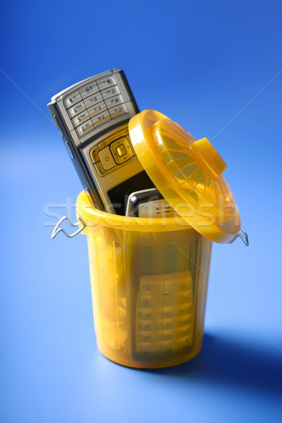 Mobil cell phone on the trash Stock photo © lunamarina