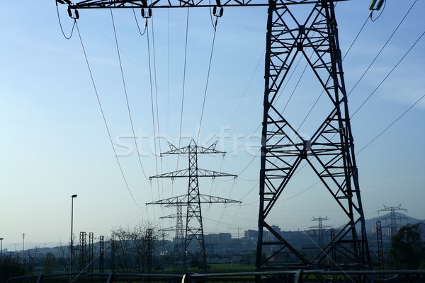 Electric pole towers backlight  sky background Stock photo © lunamarina