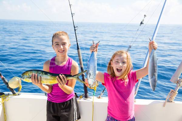 Boldog tonhal gyerek lányok halfajok zsákmány Stock fotó © lunamarina