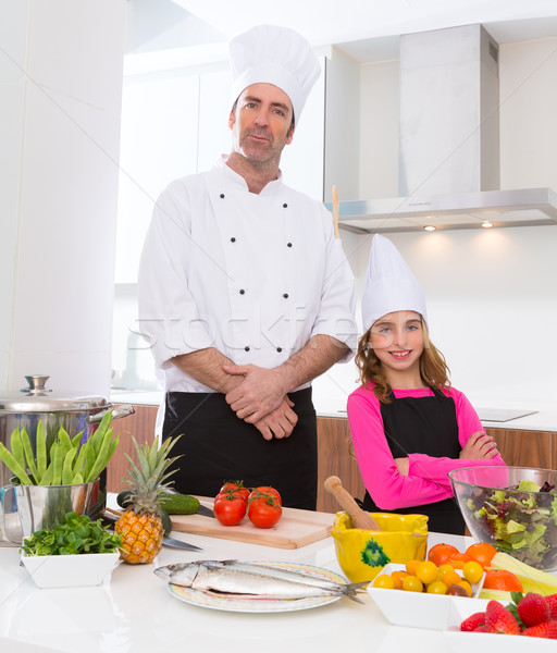 Chef master and junior pupil kid girl at cooking school Stock photo © lunamarina