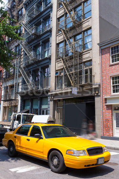 New York Soho buildings yellow cab taxi NYC USA Stock photo © lunamarina