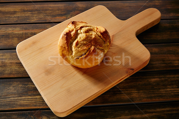 Bread round loaf on wooden board in rustic wood Stock photo © lunamarina