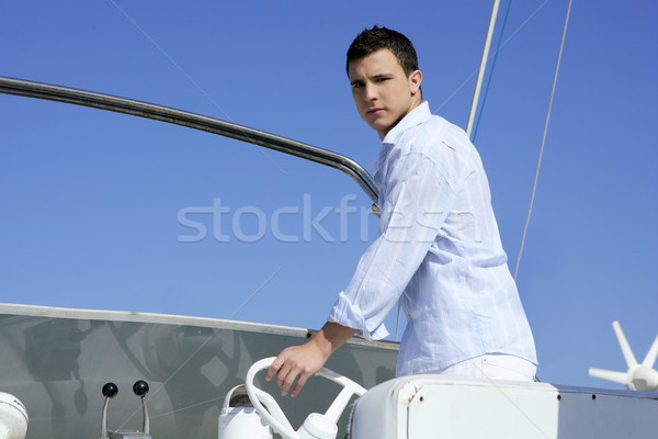 Handsome young man on boat, summer vacation Stock photo © lunamarina