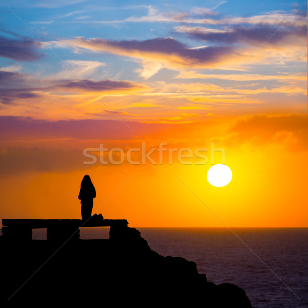 Ciutadella Menorca at Punta Nati sunset with girl Stock photo © lunamarina