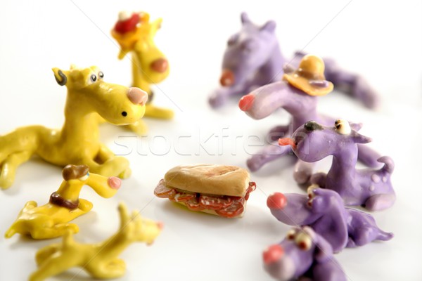 Handmade hungry plasticine dogs, meat to eat Stock photo © lunamarina