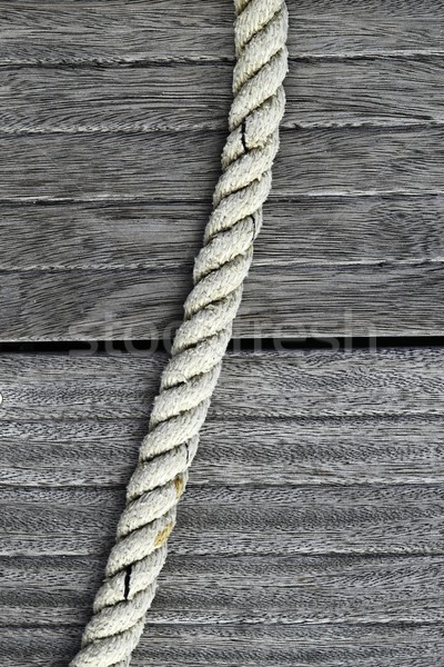 marine rope over gray aged teak wood Stock photo © lunamarina