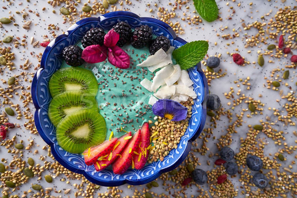 Acai bowl smoothie kiwi blackberry strawberry Stock photo © lunamarina