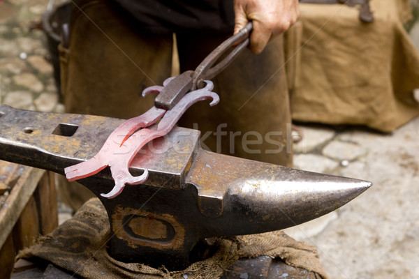 blacksmith forged iron smith anvil hammerman Stock photo © lunamarina