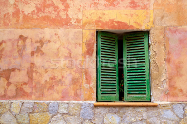 Geleneksel ahşap pencereler ev duvar Stok fotoğraf © lunamarina