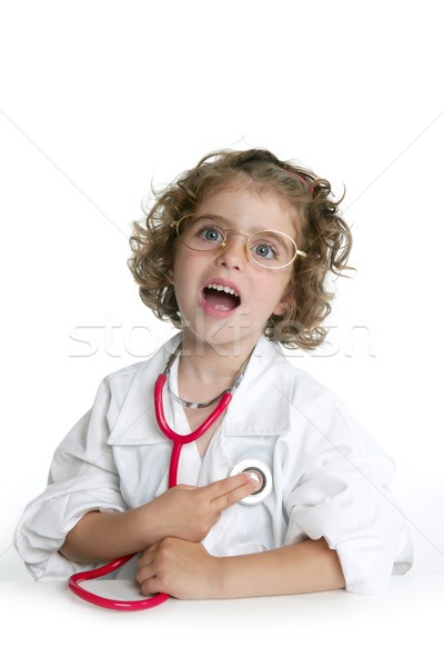Cute little girl pretending to be a doctor Stock photo © lunamarina