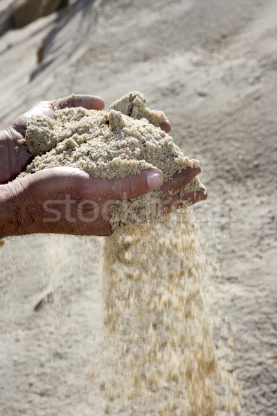 gravel sand in man hands in quarry background Stock photo © lunamarina