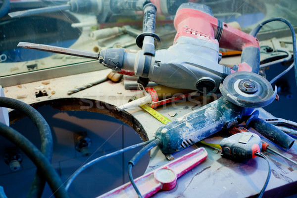 home improvement  messy clutter with dusted tools Stock photo © lunamarina