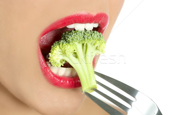 [[stock_photo]]: Brocoli · acier · fourche · femme · bouche · lèvres · rouges