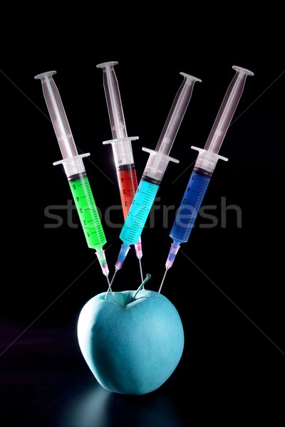 apple manipulation with syringes Stock photo © lunamarina