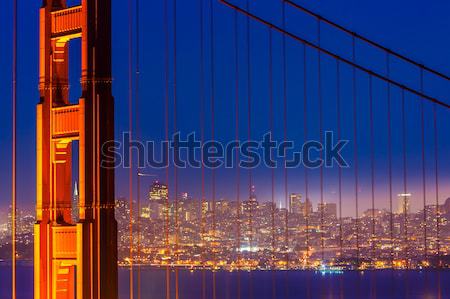 San Francisco Golden Gate Bridge sunset through cables Stock photo © lunamarina