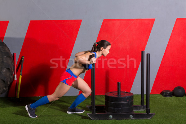 [[stock_photo]]: Femme · poussant · poids · entraînement · exercice