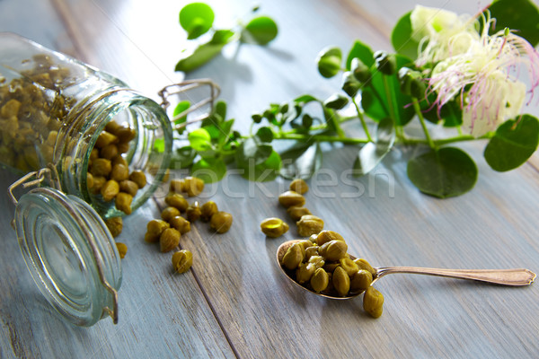 Capers pickled with plant and caper plant flower Stock photo © lunamarina
