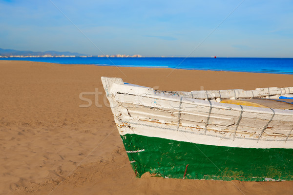 Valencia La Malvarrosa beach boats stranded Stock photo © lunamarina
