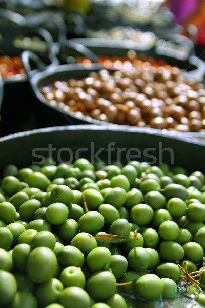 Stock photo: olives in pickling brine background texture
