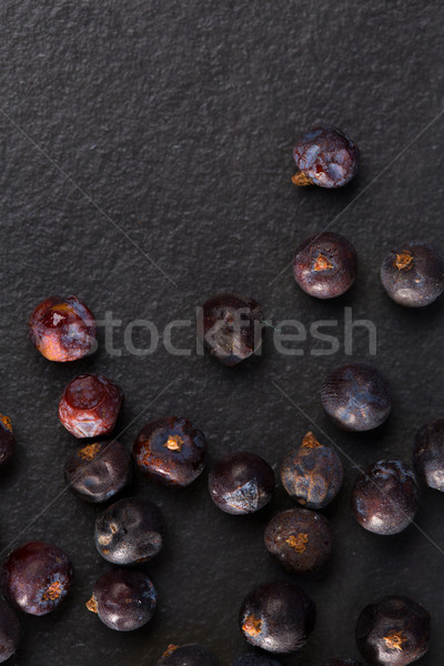  juniper berries macro detail closeup on black Stock photo © lunamarina