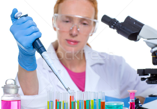 chemical laboratory scientist woman working with pipette Stock photo © lunamarina