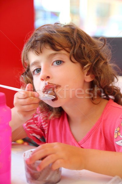 Girl eating chocolate ice cream dirty face Stock photo © lunamarina