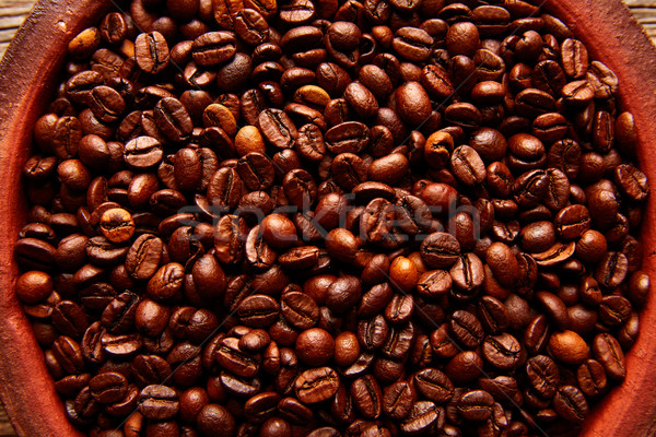 Coffee beans in a clay dish texture Stock photo © lunamarina