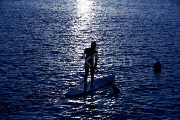 Stand up surf ragazza cielo acqua Foto d'archivio © lunamarina