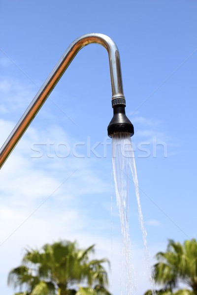 Zuhany locsoló kék ég szabadtér víz zuhan Stock fotó © lunamarina