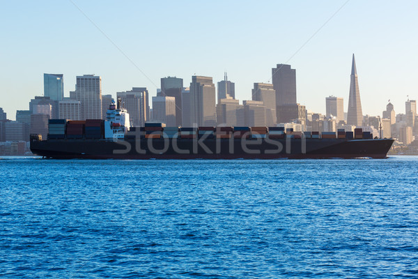 San francisco Skyline with merchant ship cruising bay at Califor Stock photo © lunamarina