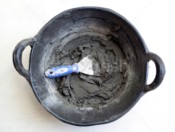 cement portland gray fresh mortar mix with spatula Stock photo © lunamarina