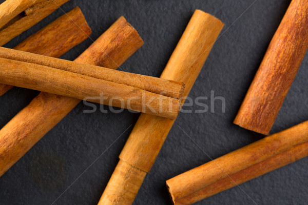 Stock photo: Cinnamon spice macro closeup detail on black