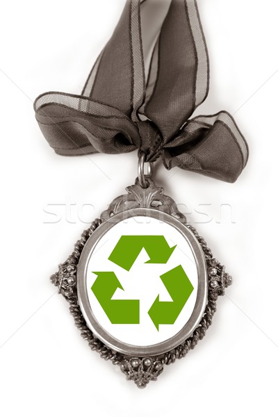 Cameo silver locket with green recycle symbol Stock photo © lunamarina