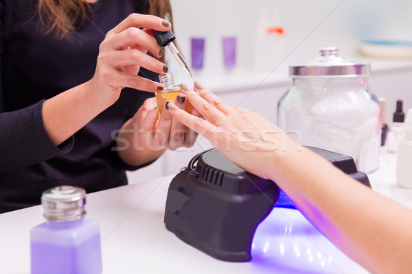 Paznokci uv szybki wyschnięcia lakier do paznokci manicure Zdjęcia stock © lunamarina
