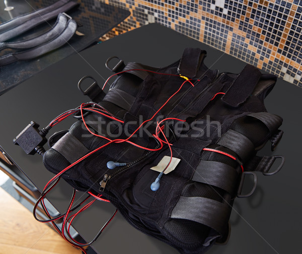 EMS electro stimulation suit detail on black  Stock photo © lunamarina
