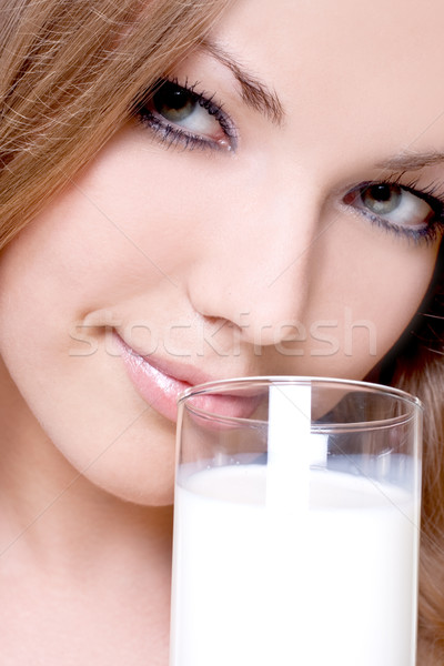 Güzel bir kadın içme süt güzel kadın renkli Stok fotoğraf © Lupen