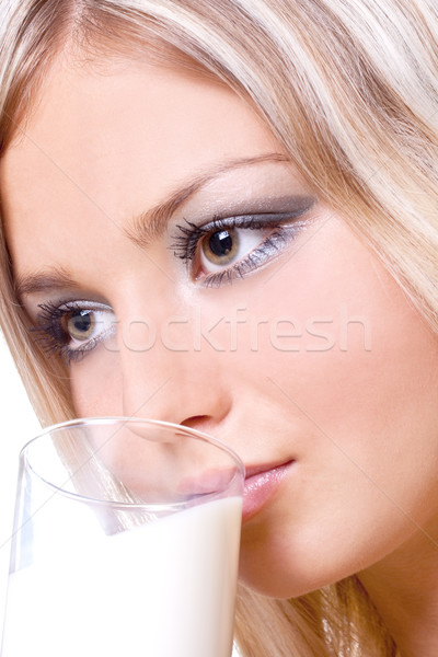 Piękna kobieta pitnej mleka biały kobieta twarz Zdjęcia stock © Lupen