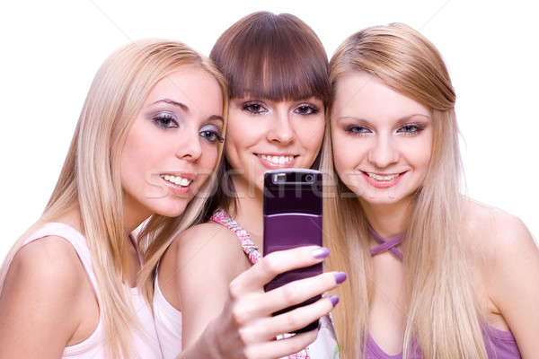 Trzy dziewcząt telefonu biały kobieta kobiet Zdjęcia stock © Lupen