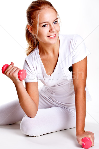 pink dumbbells in the hands of women Stock photo © Lupen