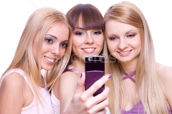 Drie meisjes telefoon witte vrouw vrouwen Stockfoto © Lupen