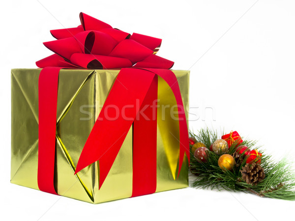 Gold and Red Holiday Gift with Pine Bough Stock photo © LynneAlbright