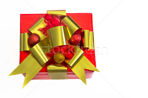 Red-Wrapped Holiday  Gift with Gold Ribbon Stock photo © LynneAlbright