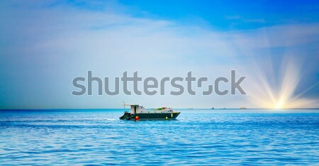 Small yacht in the sea. Stock photo © lypnyk2