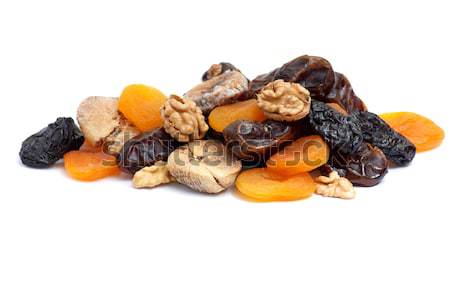 Walnuts and dried fruits collection on white. Stock photo © lypnyk2