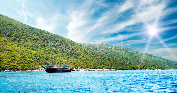 Bay in aegean sea and wooden yacht. Stock photo © lypnyk2